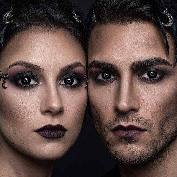 Man and woman wearing Witch contact lenses with dark gothic witch Halloween makeup
