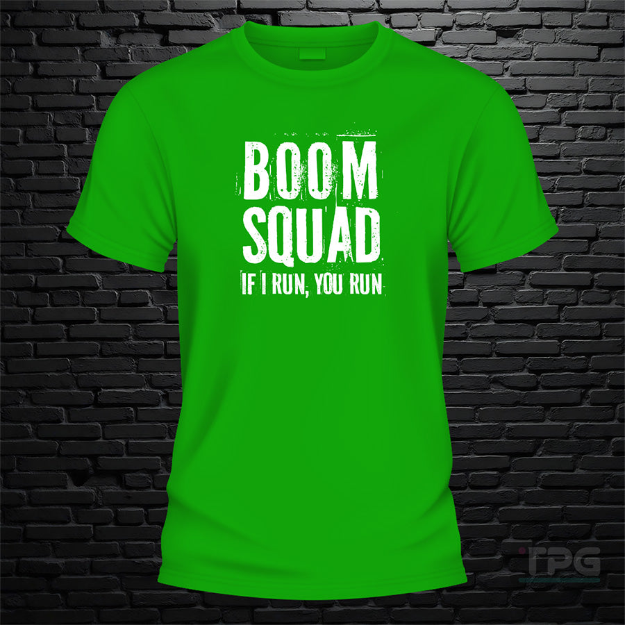 Boom Squad graphic T-shirt mockup on green brick wall