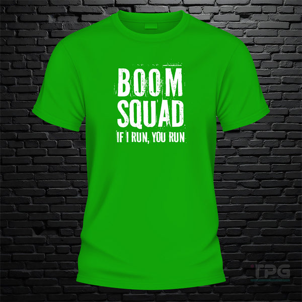 Boom Squad graphic T-shirt mockup on green brick wall