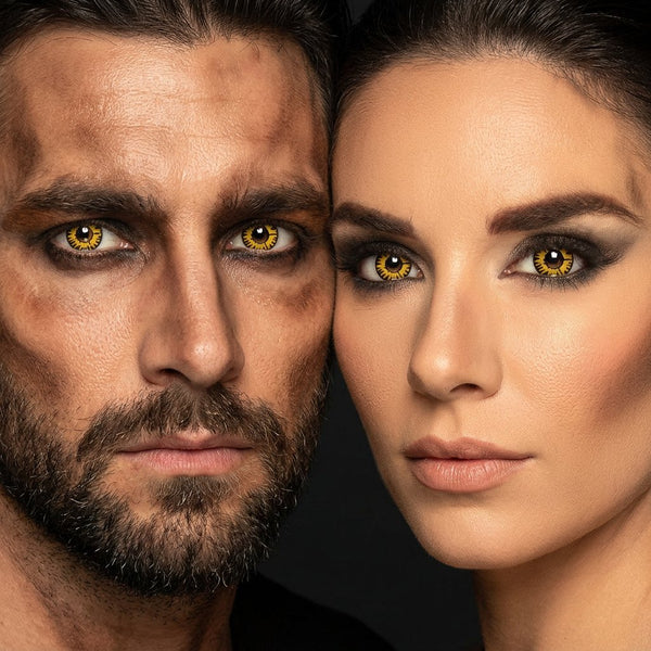 Man and woman wearing Twilight contact lenses with smoky amber werewolf Halloween makeup